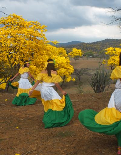 Women dancing in Bosques de Paz Transboundary Biosphere Reserve, Ecuador/Peru